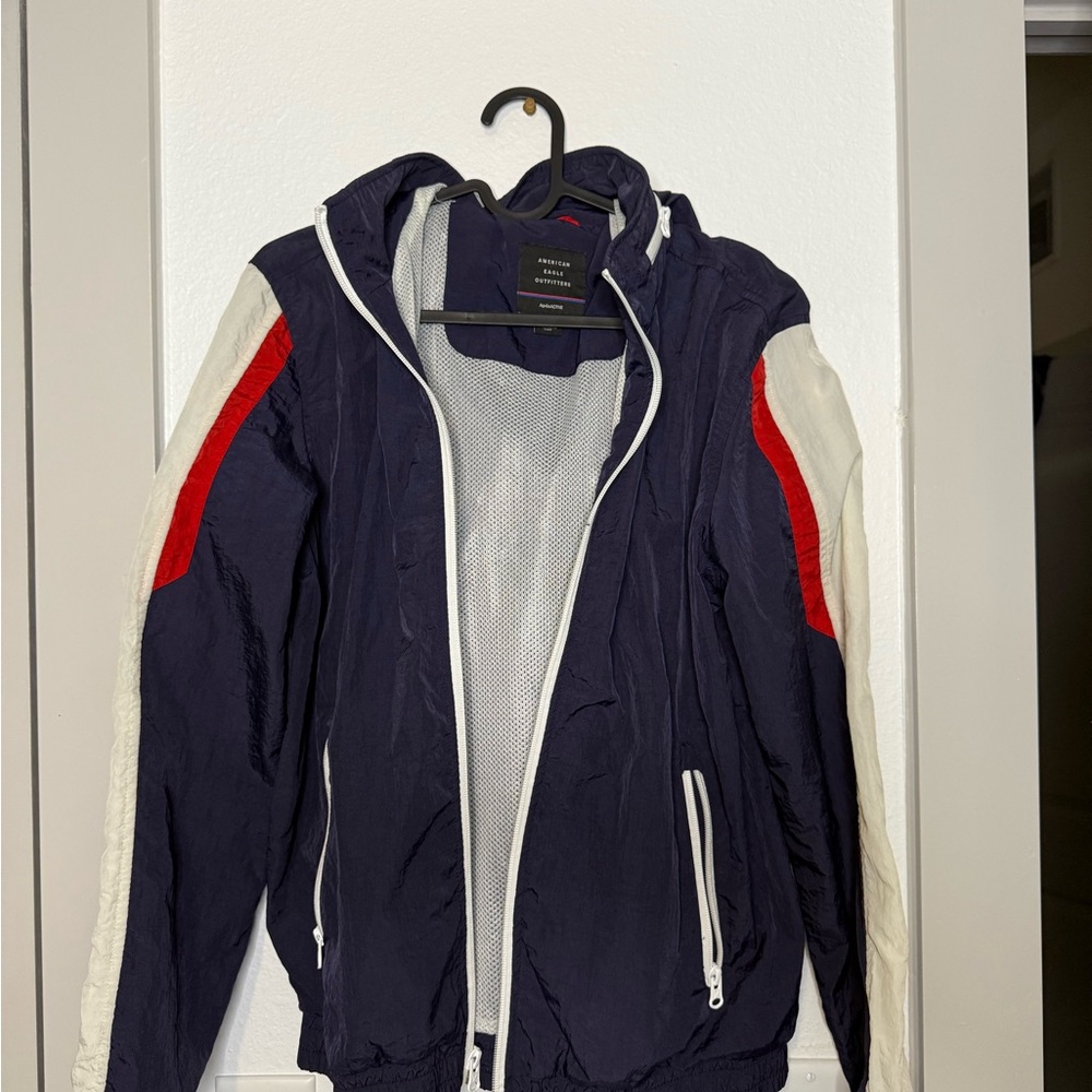 American Eagle Outfitters Navy Windbreaker with Red and White Accents
